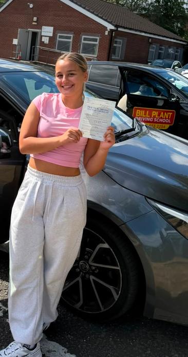 Student celebrating after completing driving lessons with DriveCrest