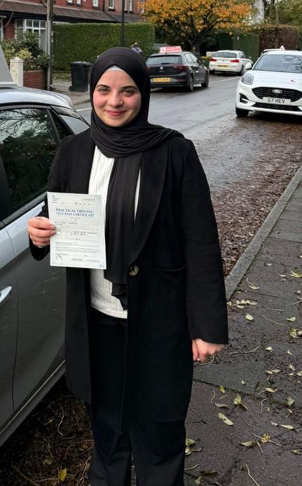 Happy new driver after driving lessons with DriveCrest in Manchester