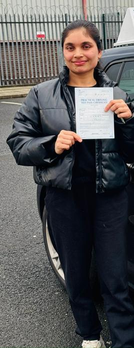 Happy new driver after driving lessons with DriveCrest in Manchester
