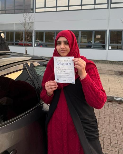 Greater Manchester driving lessons student celebrating a test pass