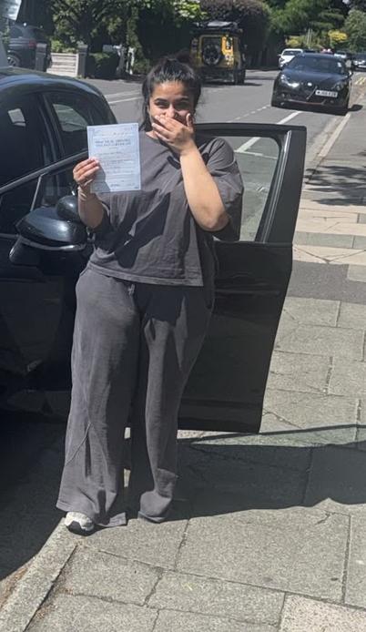 Happy new driver after driving lessons with DriveCrest in Manchester