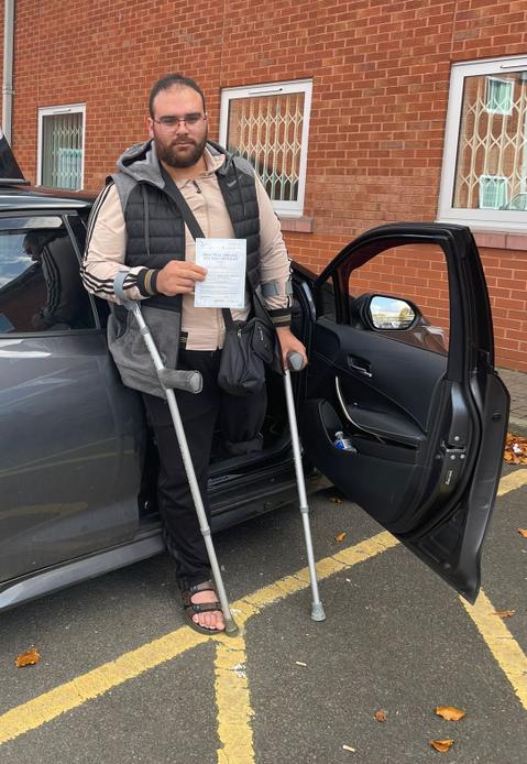 DriveCrest student celebrating after passing their driving test in Greater Manchester