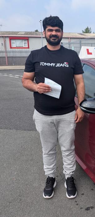 Greater Manchester driving lessons student celebrating a test pass