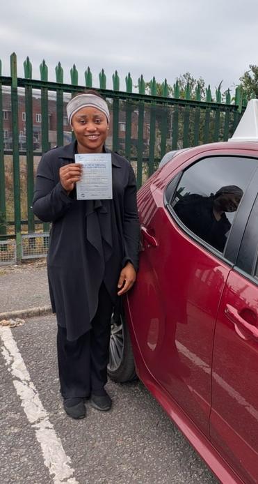 Manchester learner celebrating becoming a qualified driver with DriveCrest