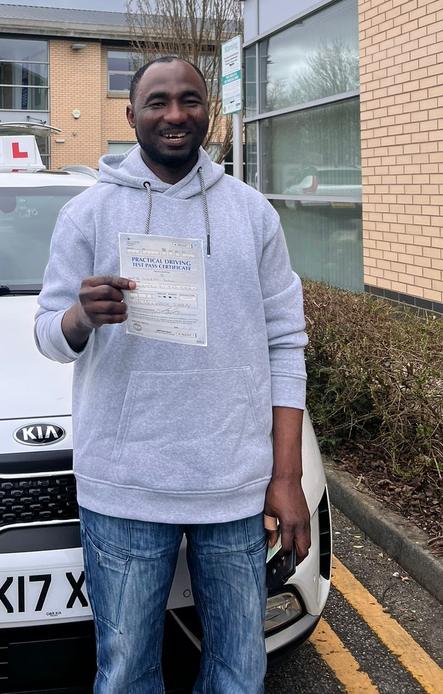 Manchester learner celebrating becoming a qualified driver with DriveCrest