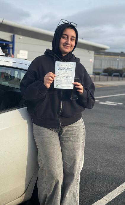 DriveCrest learner celebrating a driving test pass in Greater Manchester